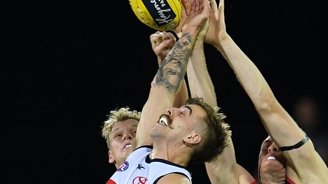 Jordan Gallucci launches for the high ball against Melbourne. Picture: AAP Image/Dan Peled