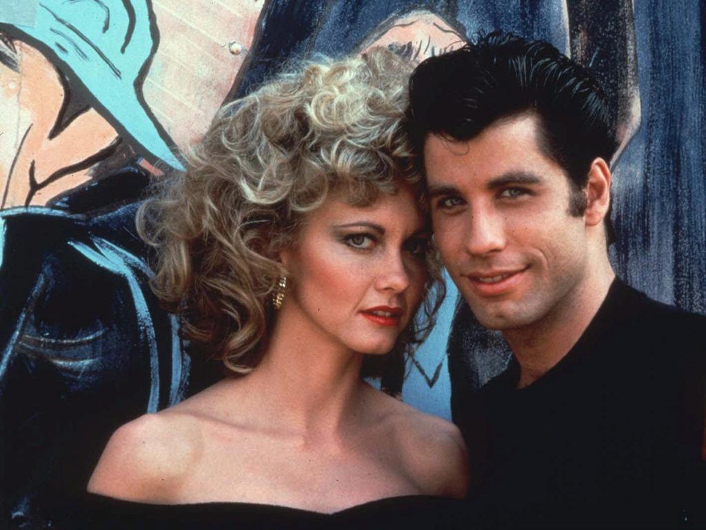 Two high schools have cancelled their production of Grease, which starred John Travolta and Olivia Newton-John in the 1978 film, because the themes are outdated.