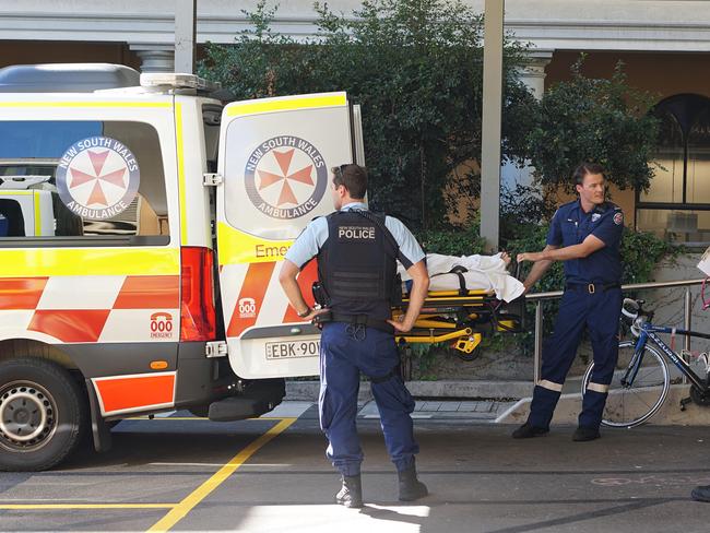 Police and paramedics bring a new arrival to St Vincent’s Emergency Department in Melbourne. Picture: Mark Isaacs