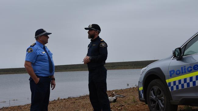 Bridgewater Division Acting Inspector Jason Klug with Sergeant Brad Conyers at Great Lake's Boundary Bay after the discovery at 11.40am Friday of the body of a missing 50-year-old fisherman. Picture: Alex Treacy