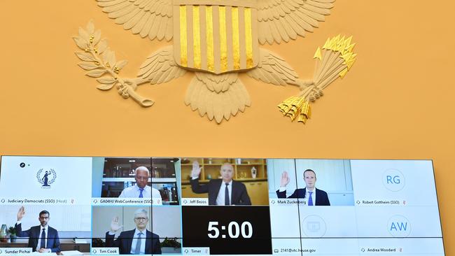 Amazon CEO Jeff Bezos (top, C), Facebook CEO Mark Zuckerberg (top, R), Google CEO Sundar Pichai (bottom, L), and Apple CEO Tim Cook prepare to appear before Congress via videolink. Pic: AFP