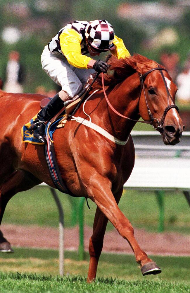 Saintly on his way to a commanding win in the 1996 Melbourne Cup.