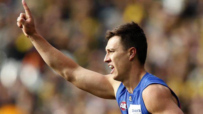 MELBOURNE, AUSTRALIA - AUGUST 25: Hugh McCluggage of the Lions celebrates a goal during the round 23 AFL match between the Richmond Tigers and the Brisbane Lions at Melbourne Cricket Ground on August 25, 2019 in Melbourne, Australia. (Photo by Darrian Traynor/Getty Images)