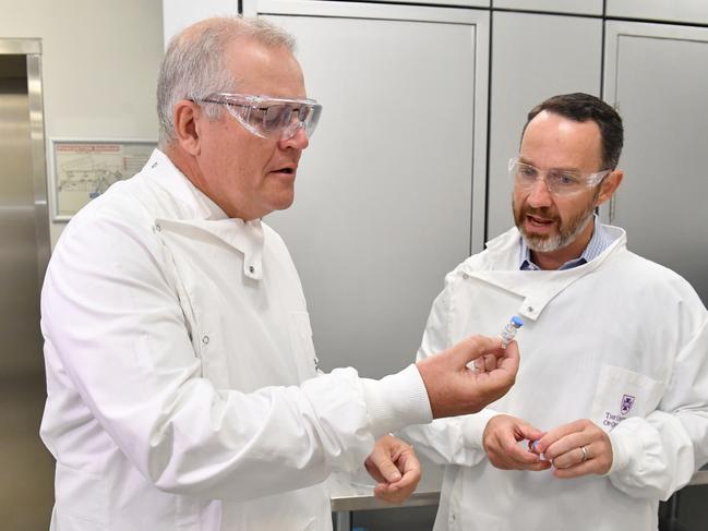 Scott Morrison with Professor Trent Munro during a tour of the University of Queensland Vaccine Lab in Brisbane in October. Picture: AAP