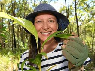 DOWN AND DIRTY: Harvest Swap founder Leonie Orton with some of the trees for planting. Picture: Warren Lynam