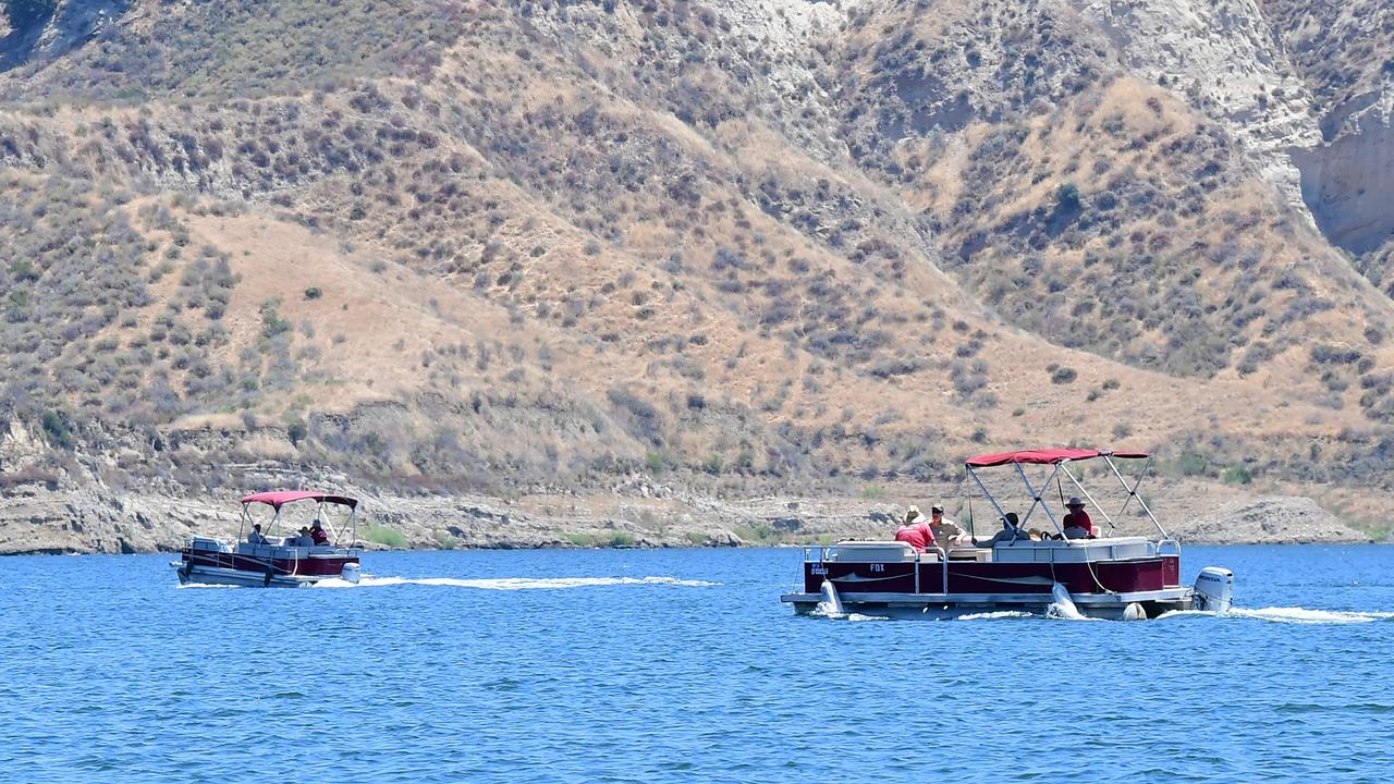 Divers and Ventura County Sheriffs on boats on Lake Piru, California, where Naya Rivera’s body was found. Picture: Frederic Brown/AFP