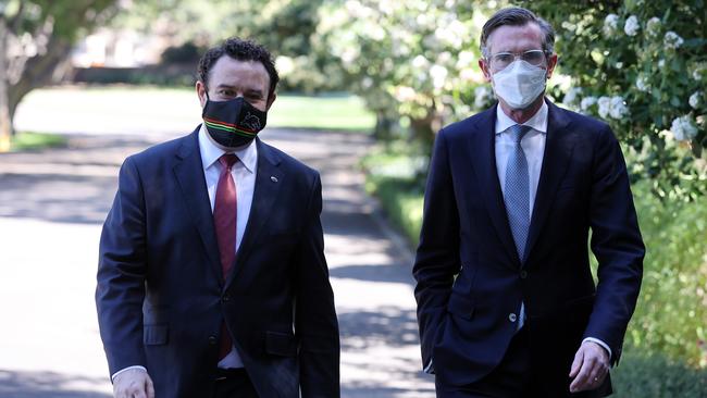 Stuart Ayres, left, and Dominic Perrottet arrive at Government House in Sydney on Tuesday. Picture: David Swift