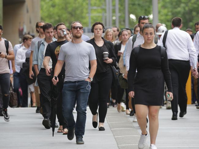 SYDNEY, AUSTRALIA - NewsWire Photos OCTOBER 22, 2020 -  Commuters, some with masks in Martin Place in Sydney on Thursday October 22, 2020.Picture: NCA NewsWire / Christian Gilles