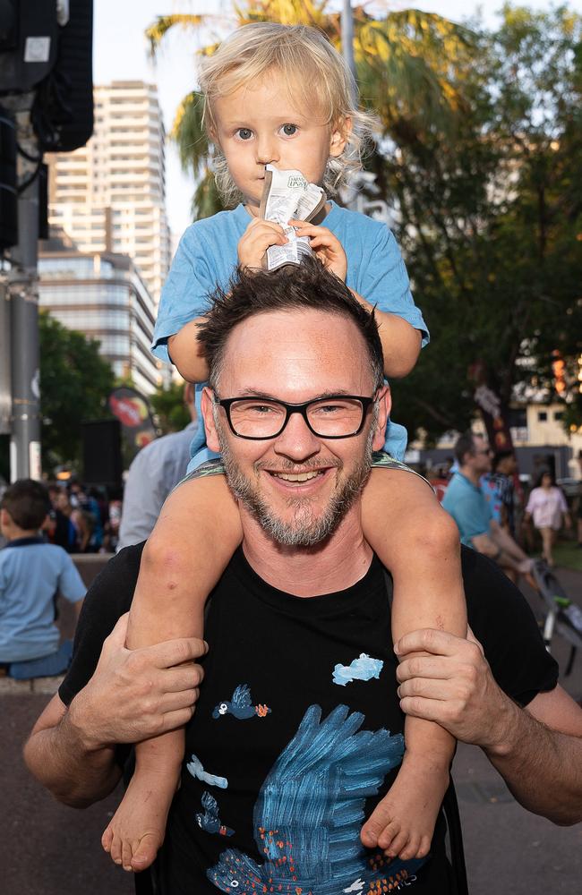 James Gough and Archer Gough were among thousands of racing fans welcomed the Night Transporter Convoy into the Darwin CBD ahead of the 2023 Darwin Supercars. Picture: Pema Tamang Pakhrin