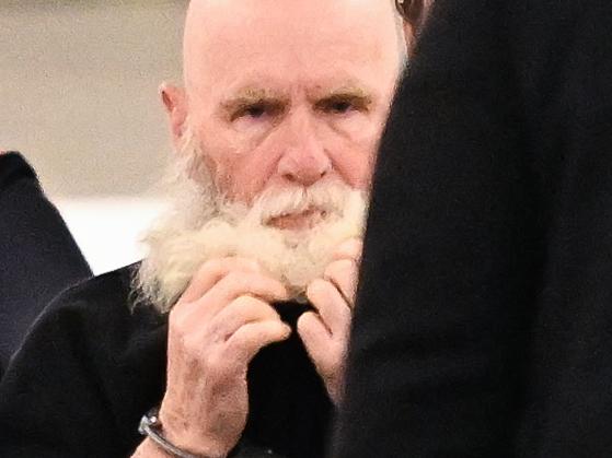 BRISBANE, AUSTRALIA - NewsWire Photos - JANUARY 9, 2025. Keith Lees arrives at Brisbane airport as he is extradited from Sydney to Brisbane to face court in Brisbane tomorrow in relation to the alleged cold case murder of Meaghan Rose almost 30 years ago. Picture: Dan Peled / NewsWire