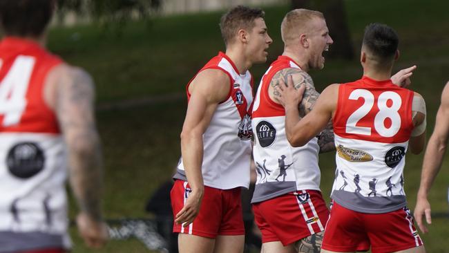 Riley D’Arcy celebrates another goal for Karingal. Picture: Valeriu Campan