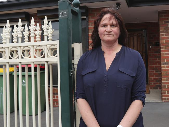 Owner Kelly outside the house which was trashed by youths. Picture: David Crosling