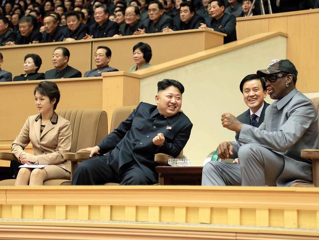 North Korean leader Kim Jong-Un (centre), his wife Ri Sol-Ju (left) and former US basketball star Dennis Rodman (right) watch a basketball game in Pyongyang in 2014. Picture: AFP/KCNA via KNS Republic of Korea