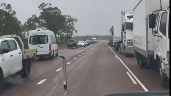 Motorists caught between the Hann and Stockyard Ck road closures on the Gregory Hwy. Credit: Heather Jonsson, Emu Apple Arts