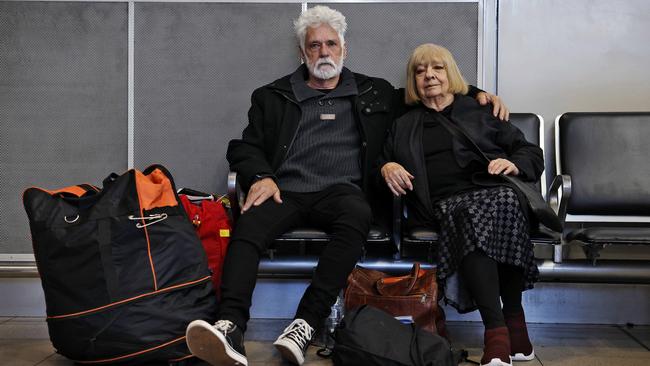 David Whyte with Pat Milne spent Friday night sleeping in the airport during the cyber outage. Picture: Sam Ruttyn