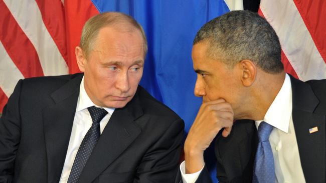 Barack Obama with Vladimir Putin. Picture: AP.