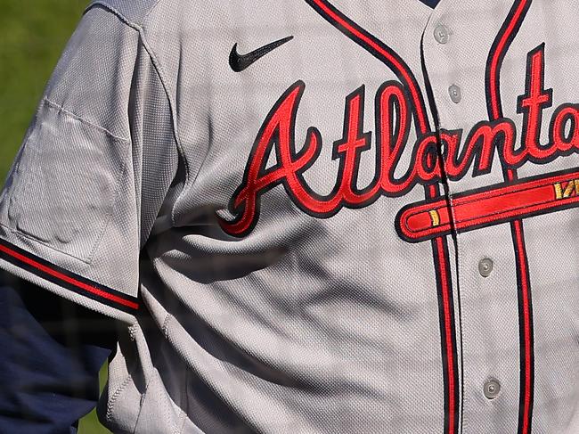 PHILADELPHIA, PA - APRIL 04: The All-Star Game logo is covered up on the right sleeve of manager Brian Snitker #43 of the Atlanta Braves during a baseball game against the Philadelphia Phillies at Citizens Bank Park on April 4, 2021 in Philadelphia, Pennsylvania. Atlanta was scheduled to be the host city of this year's All-Star Game, but MLB Commissioner Rob Manfred announced that due to Georgia's new voting laws, the league would be moving the game elsewhere. (Photo by Rich Schultz/Getty Images)