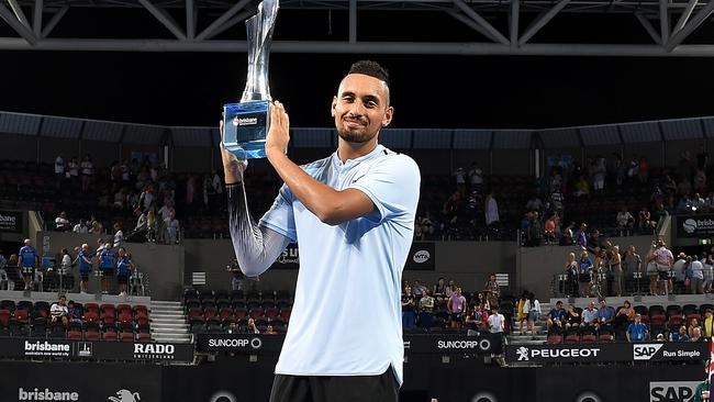 Nick Kyrgios with the Brisbane International trophy. Picture: Getty Images