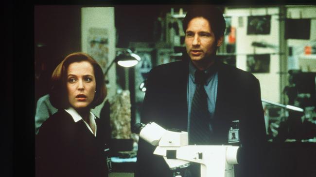 Gillian Anderson as Agent Dana Scully and David Duchovny as Agent Fox Mulder in The X-Files.