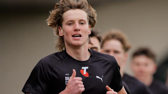 Lachie Jaques runs the 2km time trial. Picture: Dylan Burns/AFL Photos via Getty Images