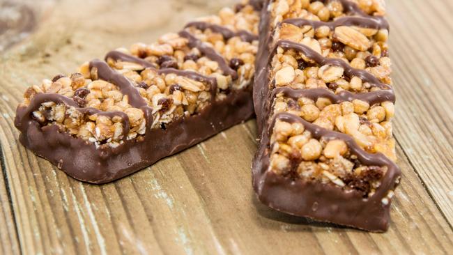 Chocolate Muesli Bars on wooden background