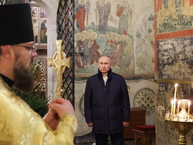 Russian President Vladimir Putin at the service in Moscow. Picture: Sputnik/AFP