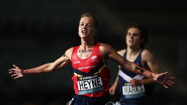 Isaac Heyne celebrates winning the U20 Mens 5000m final during the Australian Track and Field Championships at Sydney Olympic Park Athletic Centre. Picture: Getty Images)