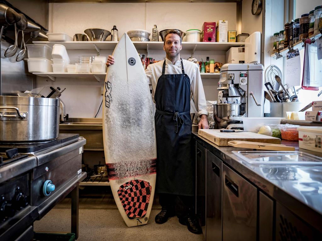 TOPSHOT - Nils Blom, 38, a Chef from Sweden, poses on March 7, 2018, in the kitchen of the restaurant in Henningsvaer, northern Norway, Lofoten islands, within Arctic Circle. “Surfing for me was following a dream as a boy, after watching Point Break when I was maybe 10 years old. To me it was very exotic, I grew up in the countryside of Sweden. I was always skateboarding and snowboarding and I said to myself “One day I’m going to surf”. When I finished school, I went abroad and started surf and then I realized there are good waves in Sweden and in Norway. I got addicted and now I enjoy surfing in cold water and the lifestyle that comes with it, not so many people in the water and more relaxed.” Picture: AFP