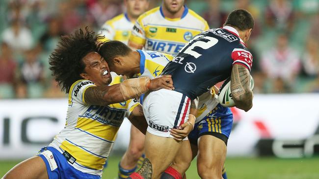 Fuifui Moimoi tackles Sonny Bill Williams. Picture: Phil Hillyard