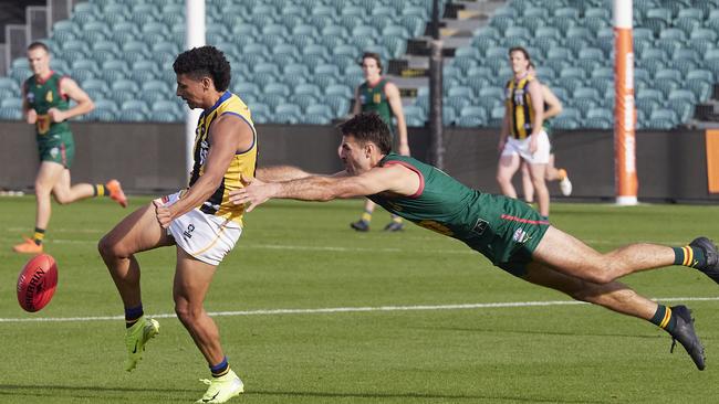 Tasmania's Bailey Boag looks to lay a tackle against Sandringham. Picture: Rod Thompson