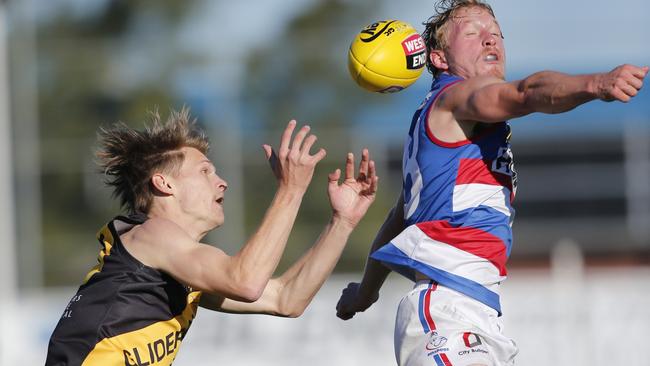 Seb Kerrish takes on Travis Schiller in the SANFL. Picture: Cory Sutton