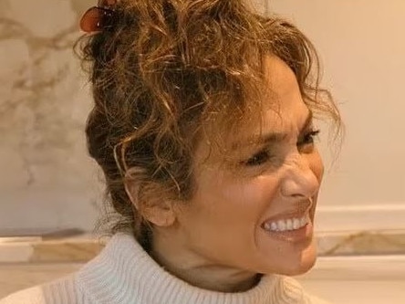 Jennifer Lopez can be seen grimacing as Jane Fonda says she's "concerned" that she's "trying to prove something" with her marriage. Picture: Supplied