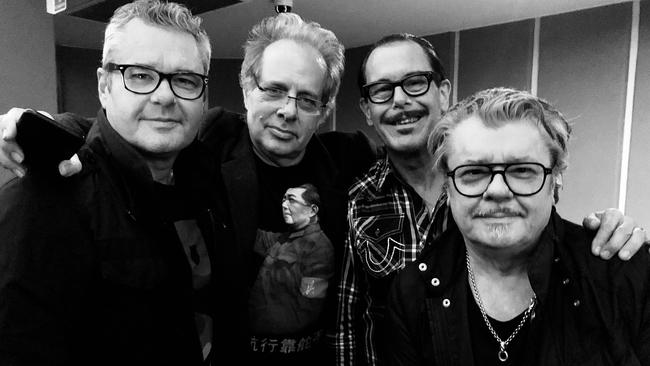 Members of INXS with Richard Lowenstein after a private screening of Mystify.