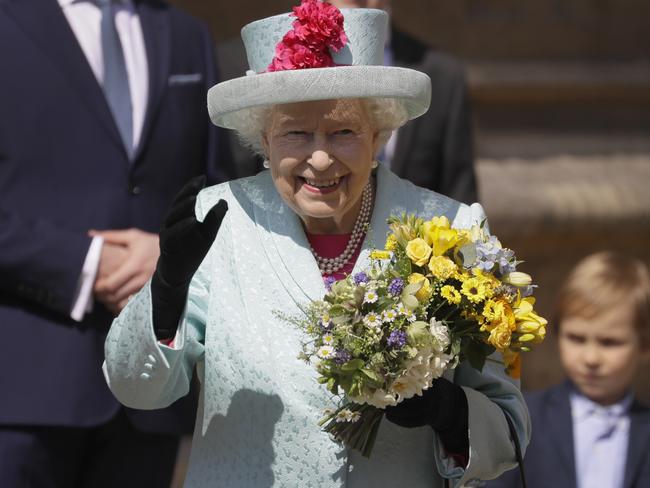 The Queen looked radiant in blue. Picture: AP