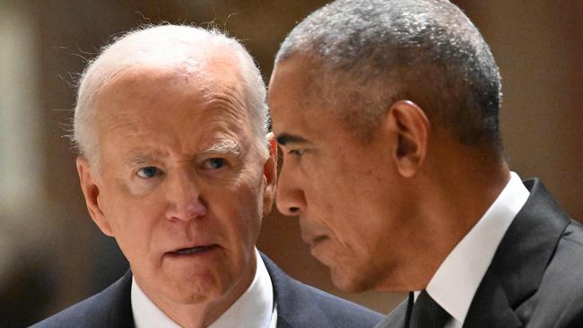 US President Joe Biden (L) and former US President Barack Obama attend a memorial service for Ethel Kennedy on October 16, 2024, at the Cathedral of St. Matthew the Apostle in Washington, DC. Kennedy, a tireless advocate for human rights and widow of assassinated US politician Robert F. Kennedy, died on October 10, 2024 at the age of 96, her family said. (Photo by Mandel NGAN / AFP)