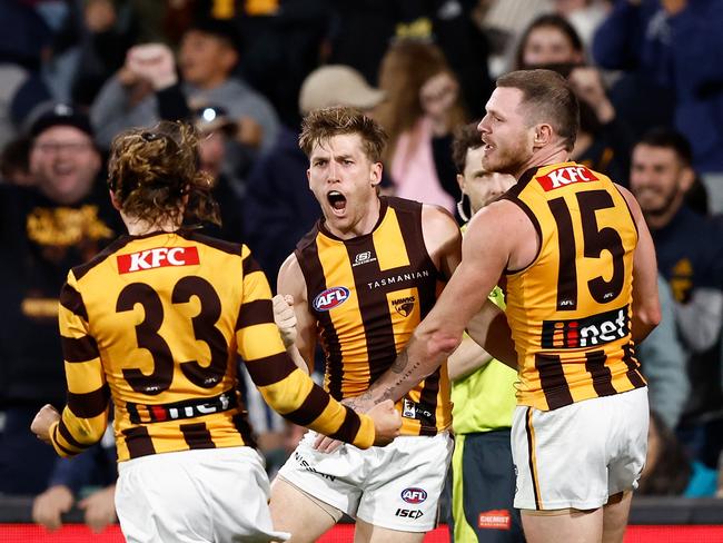 Dylan Moore celebrates after bringing his side within touching distance of the Pies on Sunday. Picture: Michael Willson/AFL Photos via Getty Images.