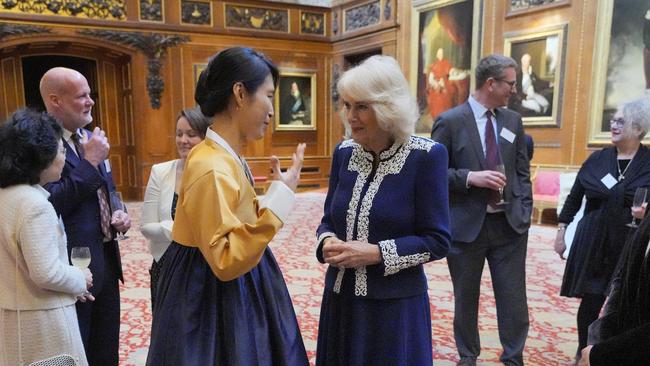 Camilla speaks to Haein Song during a reception on Tuesday, January 30, at Windsor Castle for authors, illustrators and binders. Picture: WPA Pool/Getty Images