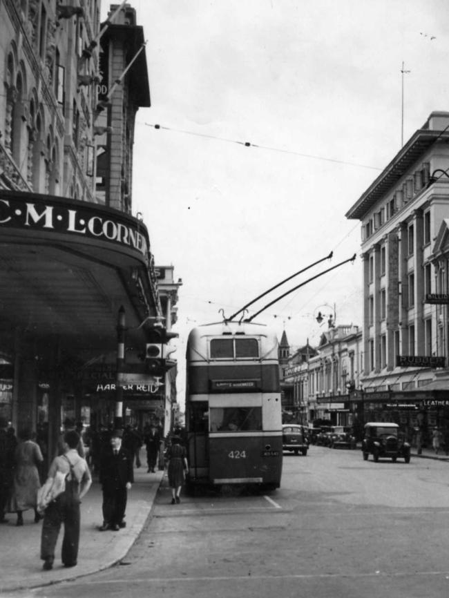 An electric double-decker trolley bus on Hindley St.