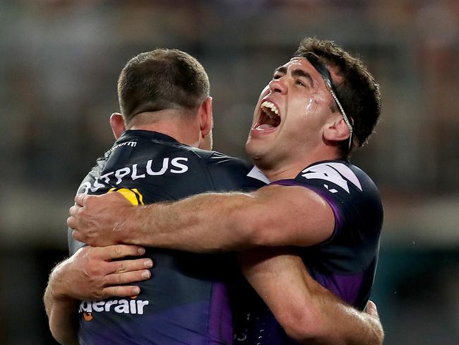 Dale Finucane celebrates a try with Cameron Smith. Picture. Phil Hillyard