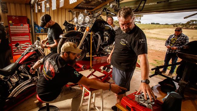 Jake Beers, Aaron Marks, Ryan Foster and Damien Barrett in the Black Ops Veterans Garage at Evanston Park. Picture: Matt Turner.