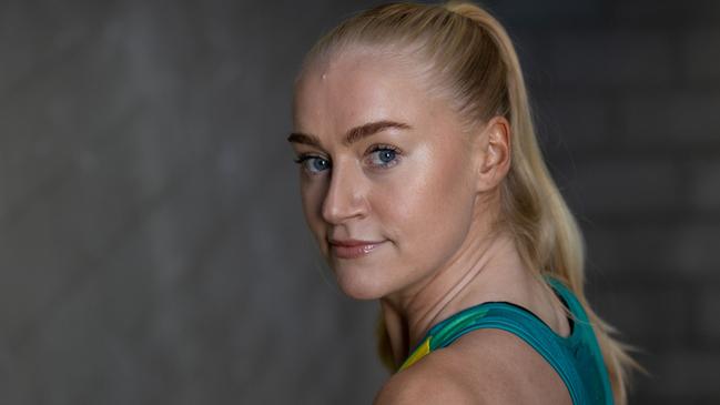 MELBOURNE, AUSTRALIA - JULY 13:  Jo Weston poses during an Australian Diamonds Portrait Session on July 13, 2023 in Melbourne, Australia. (Photo by Darrian Traynor/Getty Images for Netball Australia)