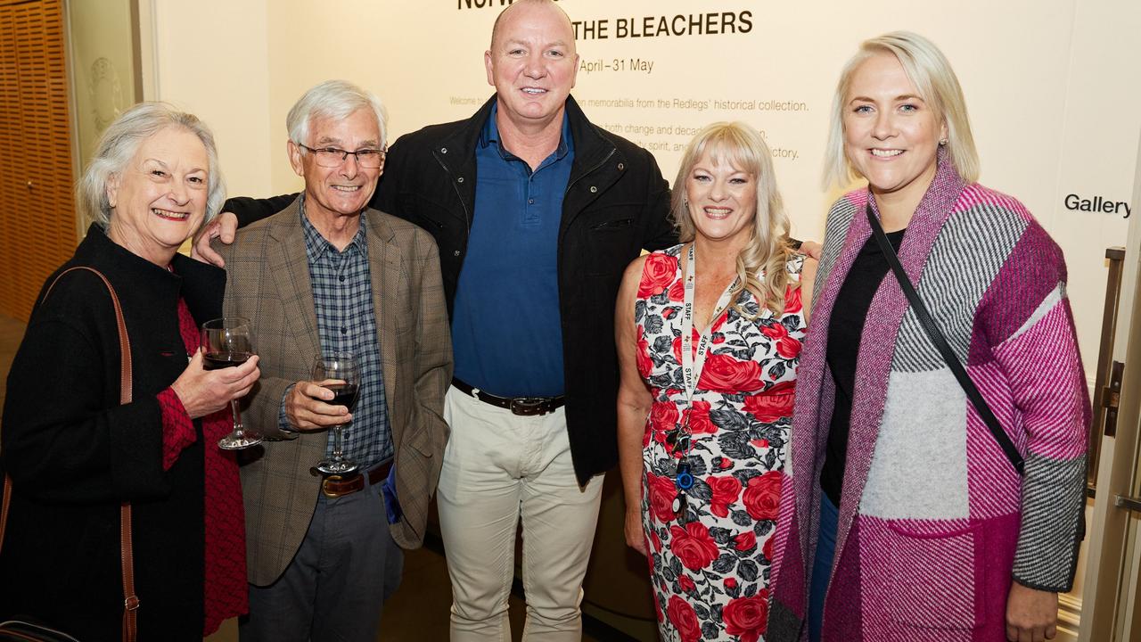 Maria and Wynton, Norwood Football Club History Committee; Dale, Norwood Football Club; exhibition curator Jacquelyne Ladner, and Christie, Norwood Football Club. Norwood footy fans have until the end of the month to soak up a fascinating display of historic memorabilia. Image: Andre<br/>Castellucci