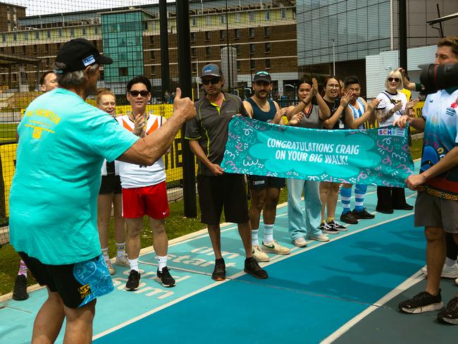 Craig Davis crossing the finish line