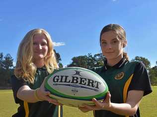 READY TO BATTLE: James Nash State High rugby players Emily Turner and Eliza Black take on Siena College today. Picture: Bec Singh