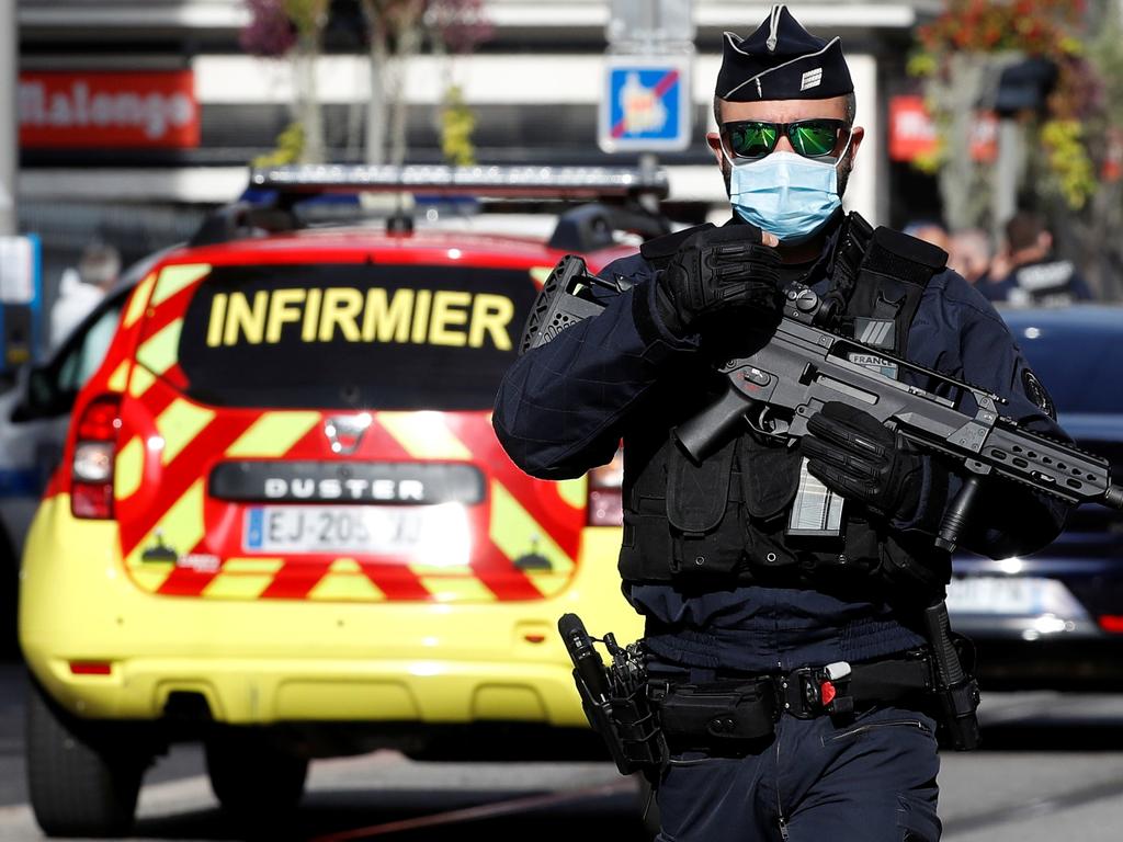 Emergency services and police on the scene. Picture: Eric Gaillard/Reuters