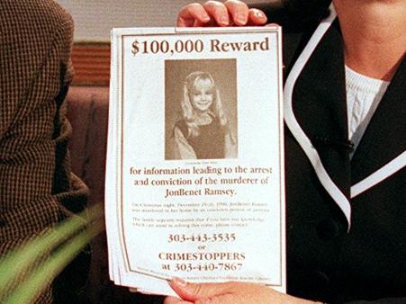 BOULDER, CO - MAY 01:  John and Patsy Ramsey, the parents of JonBenet Ramsey, meet with a small selected group of the local Colorado media after four months of silence  in Boulder, Colorado on May 1, 1997. Patsy holds up a reward sign for information leading to the arrest of their daughter's murderer.  Their 6-year-old daughter was found dead on Christmas night 1996. (Photo By Helen H. Richardson/ The Denver Post)