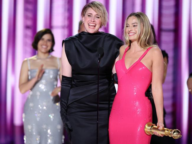 Greta Gerwig and Margot Robbie accept the award for Cinematic and Box Office Achievement for Barbie. Picture: Getty Images