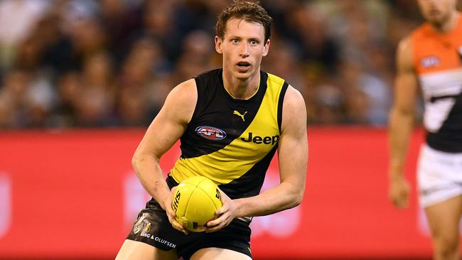 Dylan Grimes says the Tigers know the Demons will come out firing on Tuesday night.