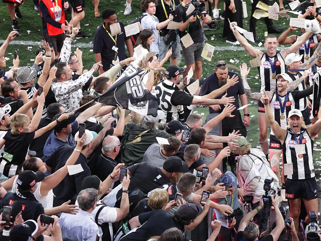 Collingwood on a victory lap after winning the 2023 Grand Final at the MCG. Picture by David Caird