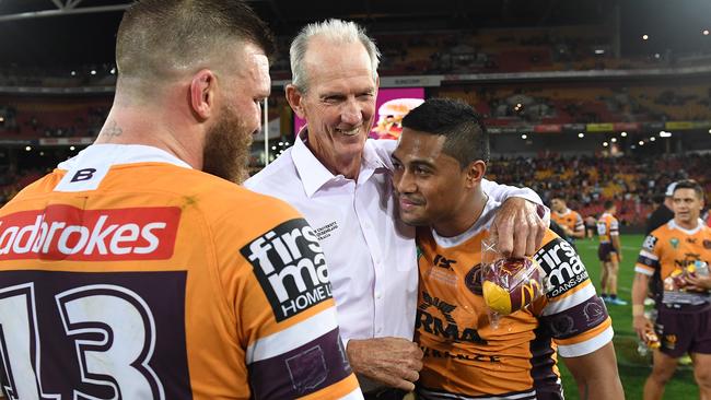 Broncos coach Wayne Bennett embraces Anthony Milford after the round 25 win over Manly.